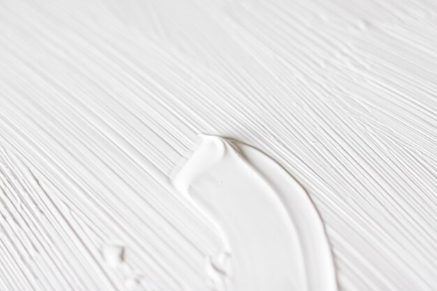 写真 化粧品の抽象的なテクスチャ背景白アクリル ペイント ブラシ ストローク テクスチャ クリーム製品高級ビューティー ブランド ホリデー バナー デザインの化粧背景として