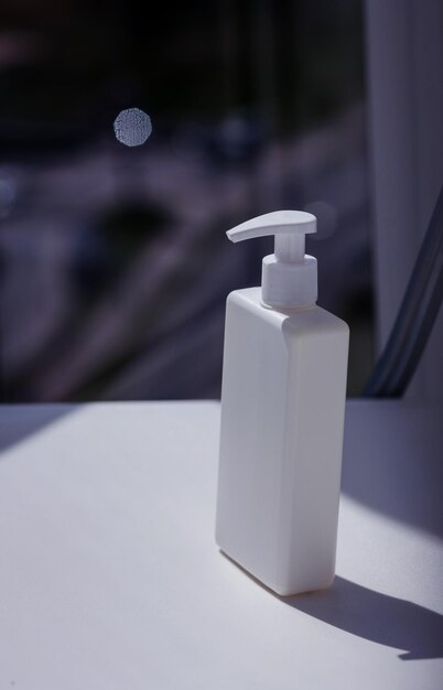 Cosmetics bottle with dispenser