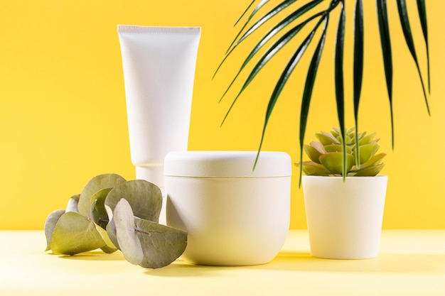 Photo cosmetics containers with plants