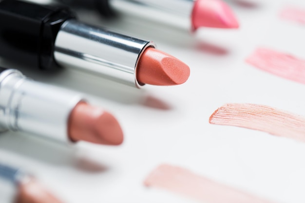 cosmetics, makeup and beauty concept - close up of lipsticks range