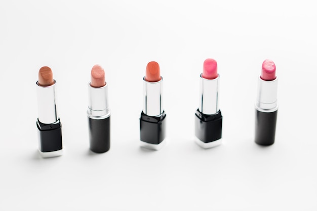 cosmetics, makeup and beauty concept - close up of lipsticks range