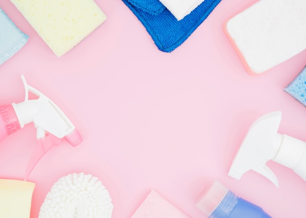 Cosmetics supplies with copy space on pink background