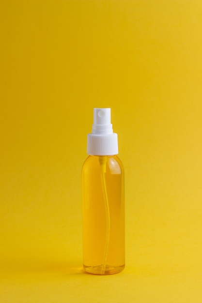 Cosmetics on yellow. Minimalism. Skincare.