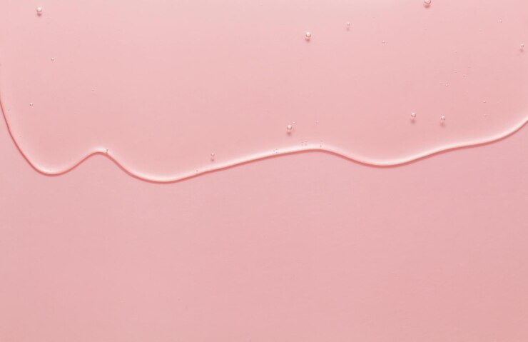 Cosmetische serumgel schoonheid op roze achtergrond
