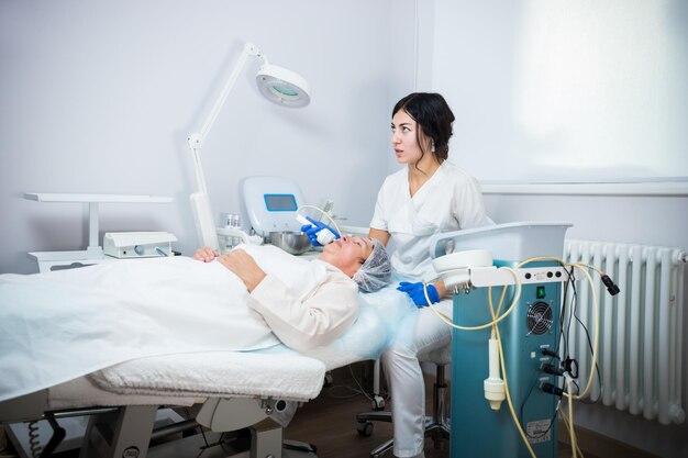 Cosmetology clinic a client taking antiaging procedure