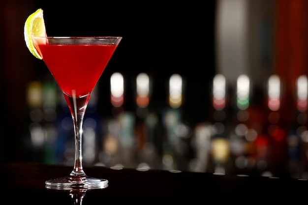 Cosmopolitan drink over black bar