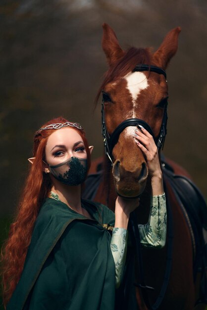 Cosplay girl elf in the forest