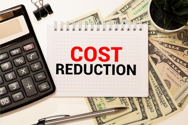 Cost Reductions words on copybook page