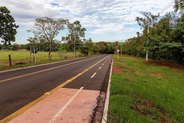 Costa Rica Mato Grosso do Sul Brazil  12 18 2022 Road leading to the brazilian municipal natural park salto do rio sucuriu with a traffic sign indicating a maximum speed of 40