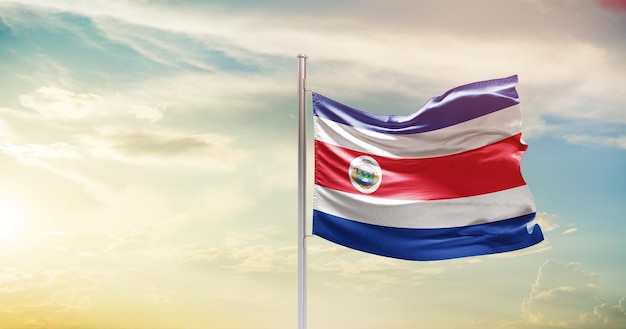 Costa Rica national waving flag in the sky