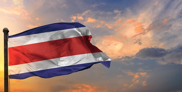 The costa_rica waving flag and sky background.