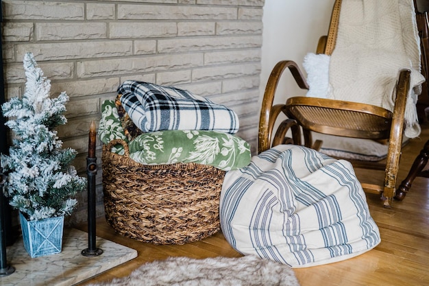 Photo cosy corner in the house with blankets and a rocking chair photo