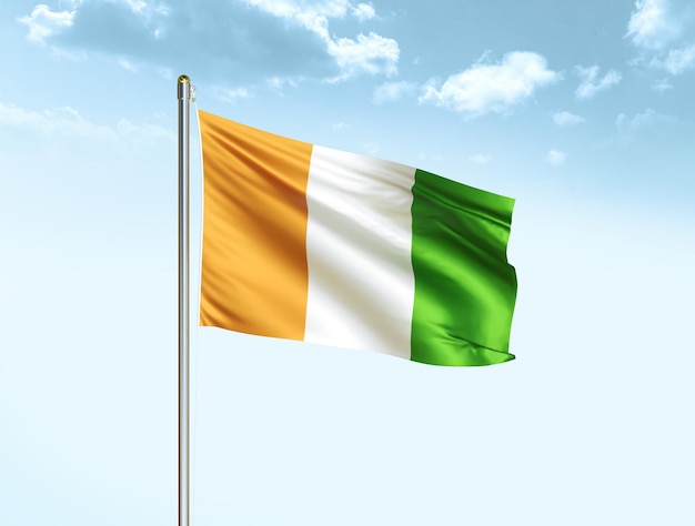 Cote d'ivoire national flag waving in blue sky with clouds Ivory Coast flag 3D illustration