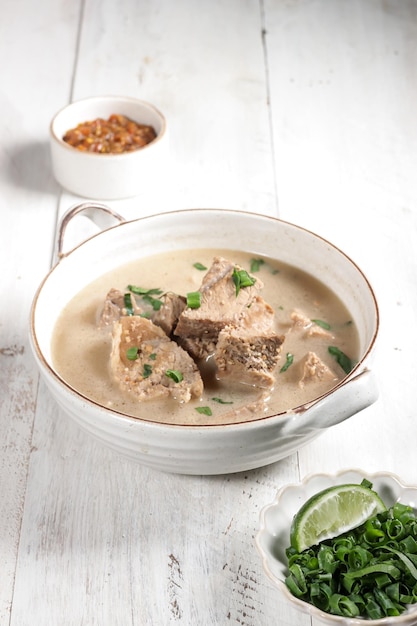 Coto Makasar is Indonesian traditional food from Makasar, Sulawesi, served with Buras.