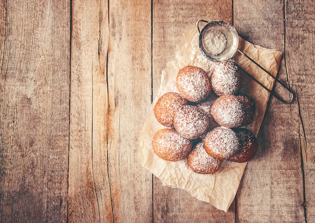 Cottage cheese balls with powdered sugar. selective focus.