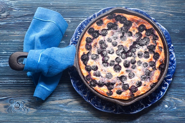 Cottage cheese casserole Cheesecake with blueberries in pan top view