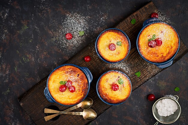 Cottage cheese casserole with cherries. Flat lay. Top view.