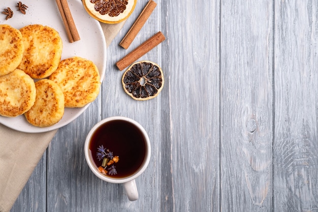 Cottage cheese fritters with hot black aromatic tea