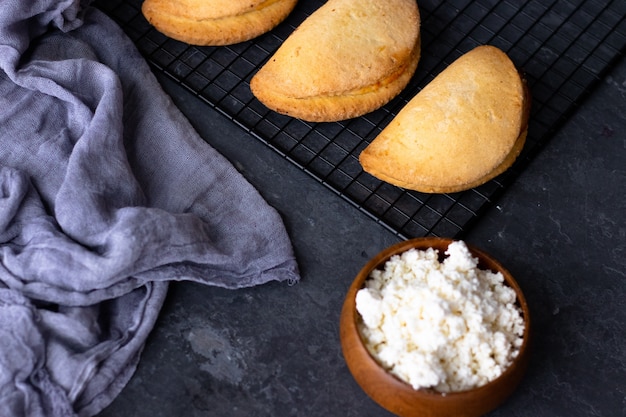 cottage cheese paies on blue background