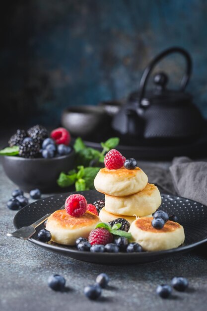 Cottage cheese pancakes with berries. Healthy Breakfast.