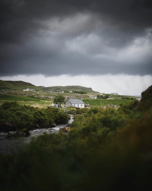 Cottage on a countryside on a misty day