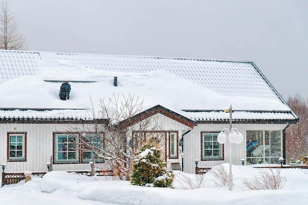 Cottage in winter countryside in Lapland, Finland