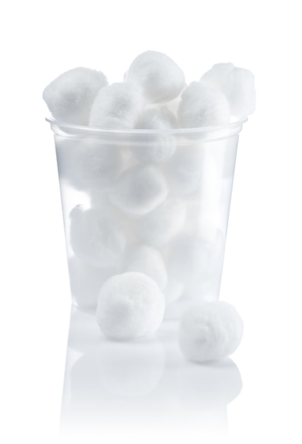 Cotton balls in jar isolated