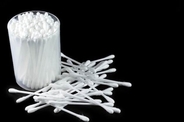 Cotton Buds isolated on black background.