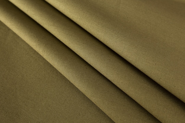 Фото Хлопчатобумажная ткань с драпированными складками льняной ткани