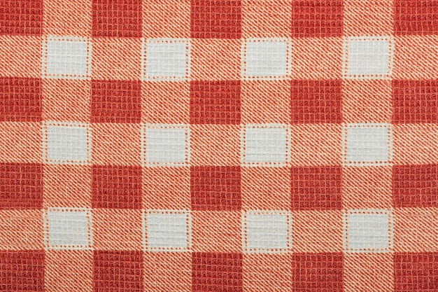 Cotton fabric with a square pattern of red tone