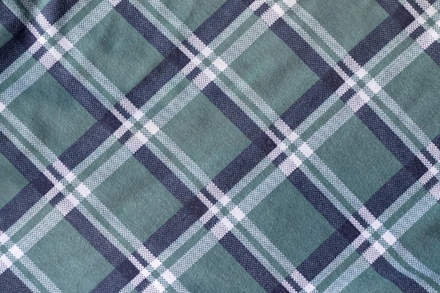 Cotton jersey plaid checked fabric texture Green blue white textile background