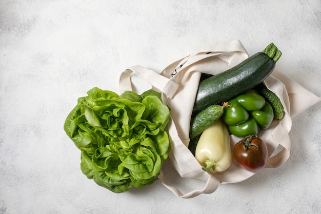 Cotton shopping bag of green healthy vegetables