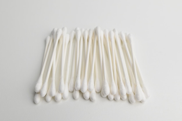 cotton sticks isolated on the white surface 