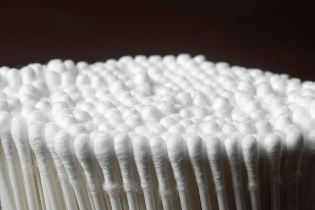 Photo cotton swabs for cleaning ears as background texture pattern