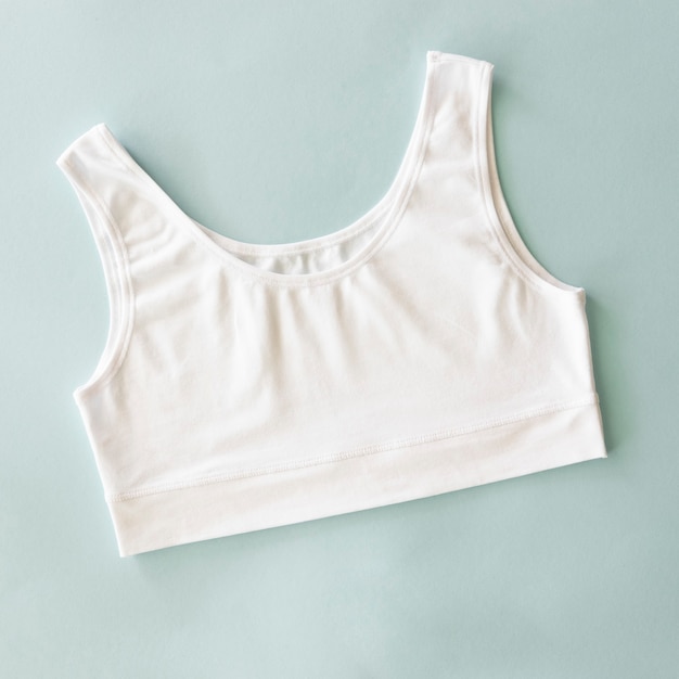 Cotton underwear top for woman white sport bra top view flat lay with space for mockup imprint