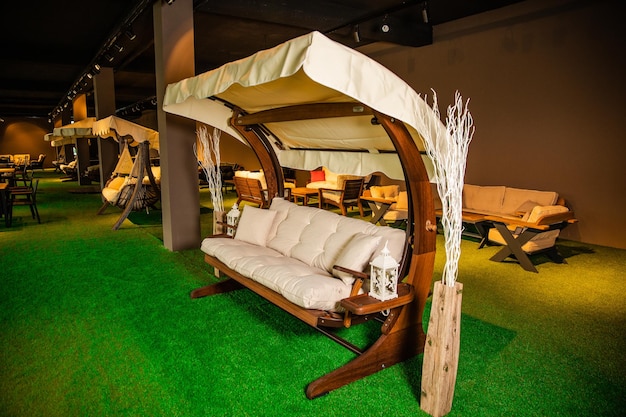 A couch in a room with a table and chairs