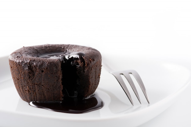 Coulant chocolate cake isolated on white