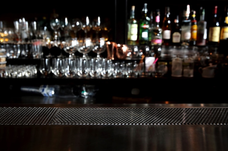Photo counter bar with glass background in dark tone