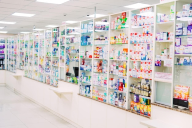 Counter store table pharmacy background shelf blurred blur\
focus drug medical shop drugstore medication blank medicine\
pharmaceutics.