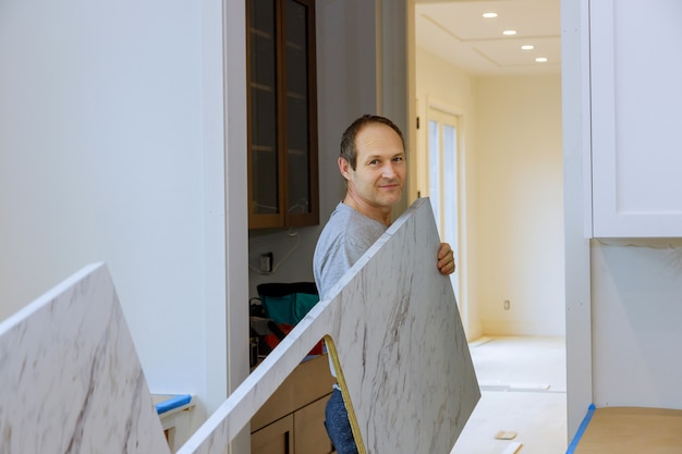 Counter top in a kitchen, carpenter installing kitchen counter top