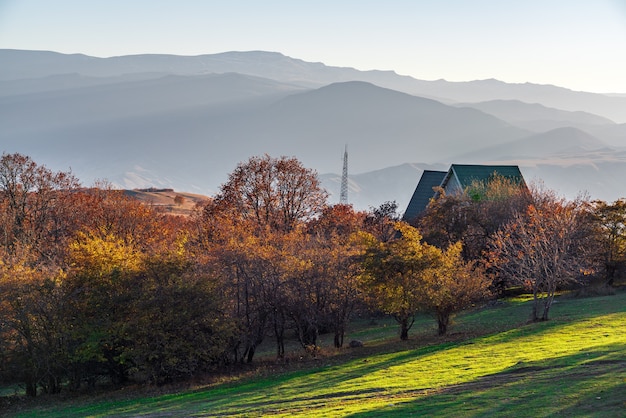 Country house in the foothills at sunset