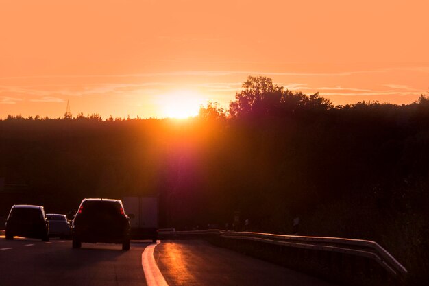 Photo country road against sky during sunset