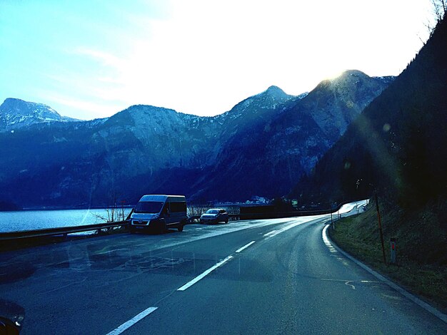 Country road leading towards mountains