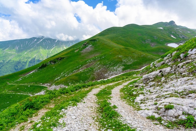 The country rocky road in the tropical mountains