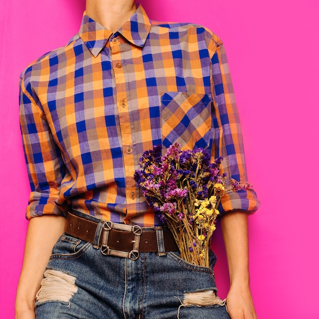 Photo country style fashion model summer. accessories. classic blue jeans, checkered shirt, belt