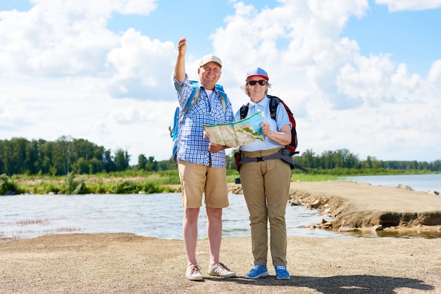 Couple of Active Senior Travelers on Hiking Trip