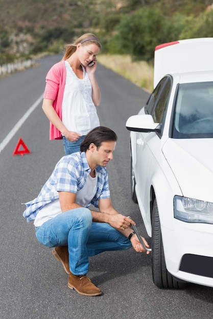 Couple after a car breakdown