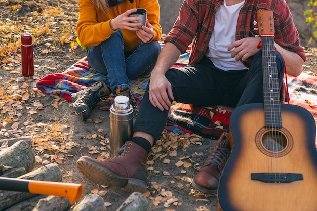 A couple are resting in nature