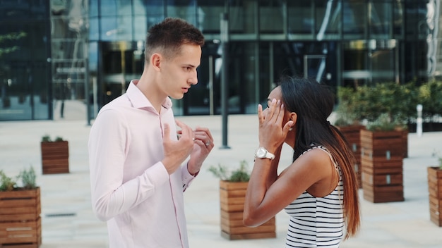 couple arguing in the street