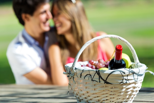 "Couple and basket with vine"